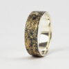 Gold Chaos - 6 mm. The ring is made from sterling silver, slightly textured with reticulation and oxidized. Gold spots are solid 18kt gold. It is random mix of gold dust, microgranules and solder fused to silver surface.