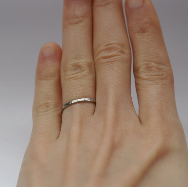 Dainty Palladium: The ring is made from flattened 1.5mm round wire, hand forged to flat shape with rounded edges. All hammer marks are then smoothened and ring is polished to shiny finish.