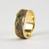 Gold Chaos Luxury: Distinctive and luxurious wedding band featuring contrast of rich yellow gold and oxidized silver.