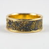 Gold Chaos Luxury: Distinctive and luxurious wedding band featuring contrast of rich yellow gold and oxidized silver.
