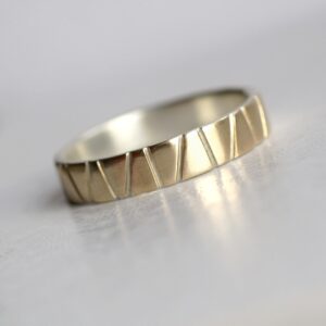 Lines in Gold - 5 mm Yellow Gold: Modern two tone wedding band, simple and elegant. It is made from two layers - sterling silver base and thin layer of solid yellow gold.