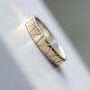 Lines in Gold - 5 mm Yellow Gold: Modern two tone wedding band, simple and elegant. It is made from two layers - sterling silver base and thin layer of solid yellow gold.