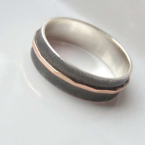 Textured - 6 mm Rose Gold: The main part of the ring is made of sterling silver, textured, oxidized and slightly polished. Central rose gold part is hammered and polished. Inside of the ring is also polished for contrast.