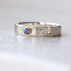 Blue Sapphire Engagement Ring: Sterling silver and 18k gold unique engagement ring or gemstone wedding band. Adorned with natural blue sapphire from Sri Lanka.