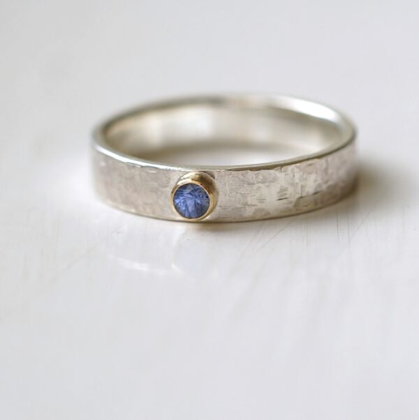 Blue Sapphire Engagement Ring: Sterling silver and 18k gold unique engagement ring or gemstone wedding band. Adorned with natural blue sapphire from Sri Lanka.