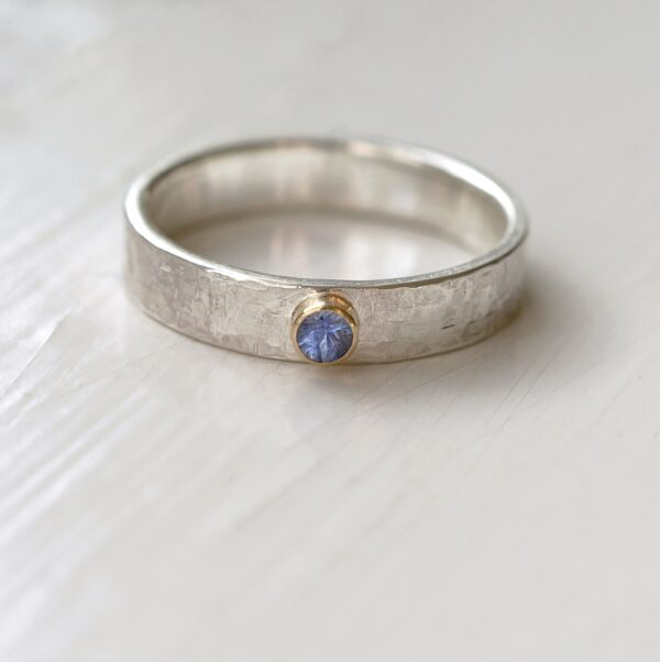 Blue Sapphire Engagement Ring: Sterling silver and 18k gold unique engagement ring or gemstone wedding band. Adorned with natural blue sapphire from Sri Lanka.