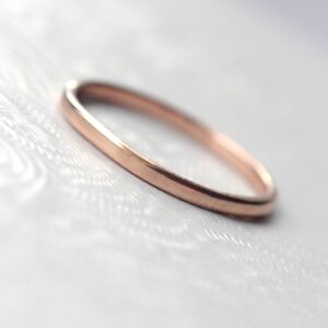 Dainty Rose Gold Wedding Band: Simple dainty rose gold wedding ring. Thin, lightweight and versatile, easy to combine with engagement ring.