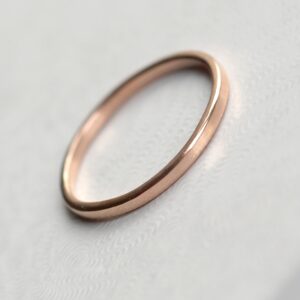 Dainty Rose Gold Wedding Band: Simple dainty rose gold wedding ring. Thin, lightweight and versatile, easy to combine with engagement ring.