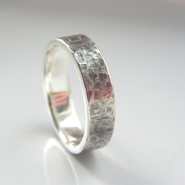 Rock Texture Ring: Unisex ring or men's band decorated with rock resembling hammered texture.