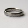 Rustic Oval Men's Wedding band: This ring is made with oval shaped wire textured with reticulation technique. It is done with many rounds of high heat treatment resulting in melting of silver surface only.