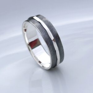 Textured - 6mm Silver: Simple and elegant ring, featuring contrast of oxidized texture and polished hammered strip in the middle.