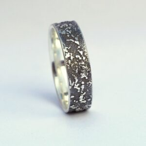 Silver Chaos - Oxidized Finish: Sterling silver wedding band with unique rustic texture. The texture is done by layering and fusing silver dust and micro pieces onto the heat treated surface of the ring.