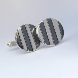 Striped Cufflinks: The stripes are oxidized and lightly polished to shiny black finish, the rest of the cufflinks is highly polished
