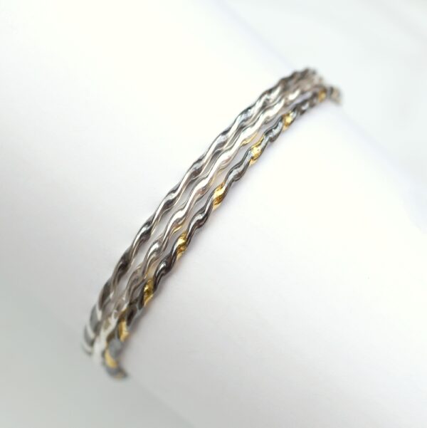 Twisted Silver Bracelets Mix: A mix of Simple twisted bangle bracelets.