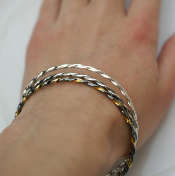 Twisted Silver Bracelets Mix: A mix of Simple twisted bangle bracelets.