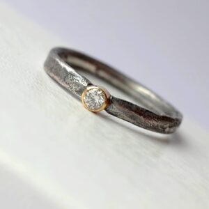 Rustic Diamond 3mm - sterling silver textured band with 3 mm diamond in 18k gold setting.