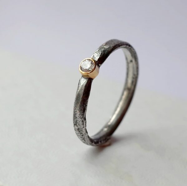 Rustic Diamond 3mm - sterling silver textured band with 3 mm diamond in 18k gold setting.