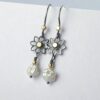 Black Daisies - romantic dainty flower earrings in oxidized sterling silver and 18k yellow gold with freshwater pearl.