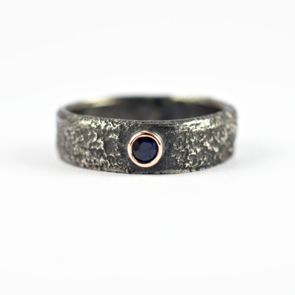 Black Sapphire Men's Engagement Ring - Rustic silver ring with black sapphire in a rose gold setting.