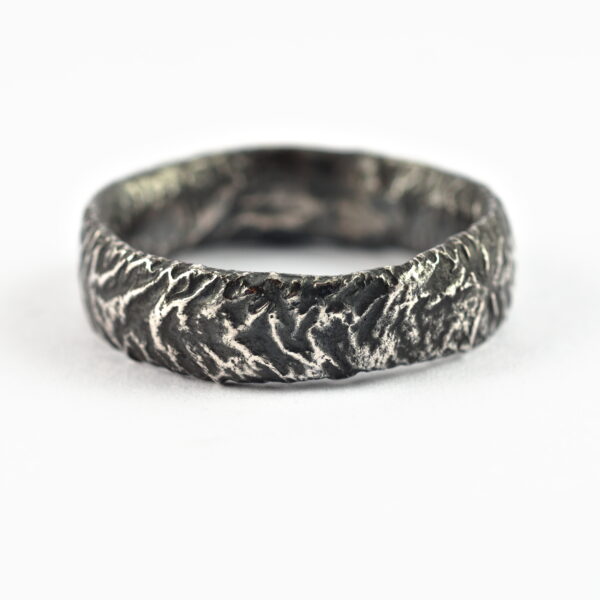 Rustic Wide Men's Wedding Band: This ring is made with oval shaped wire textured with reticulation technique. It is done with many rounds of high heat treatment resulting in melting of silver surface only.