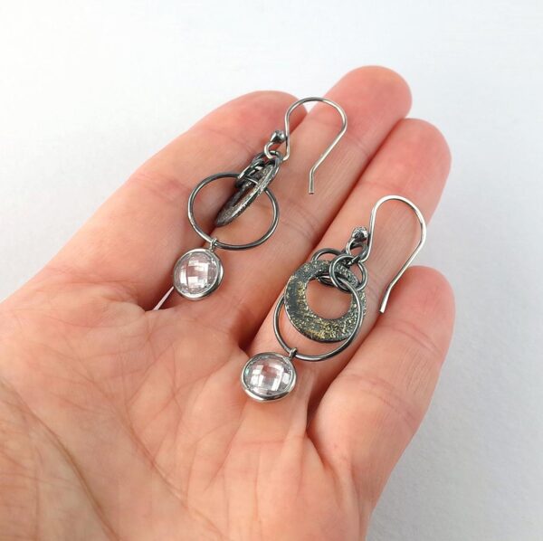Oxidized sterling silver and 18k yellow gold cubic zirconia earrings.